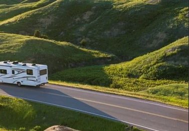 an rv on a mountain road